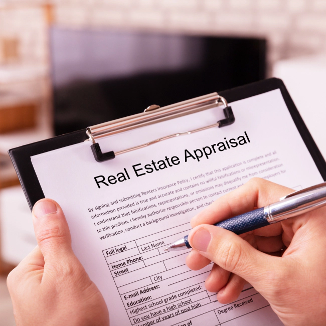 appraiser filling out real estate document zebulon nc